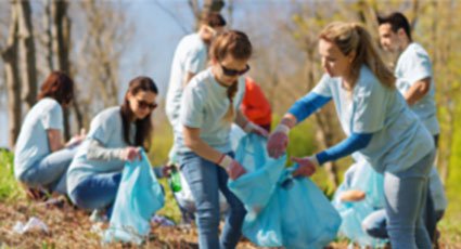 Community picking up trash in the park